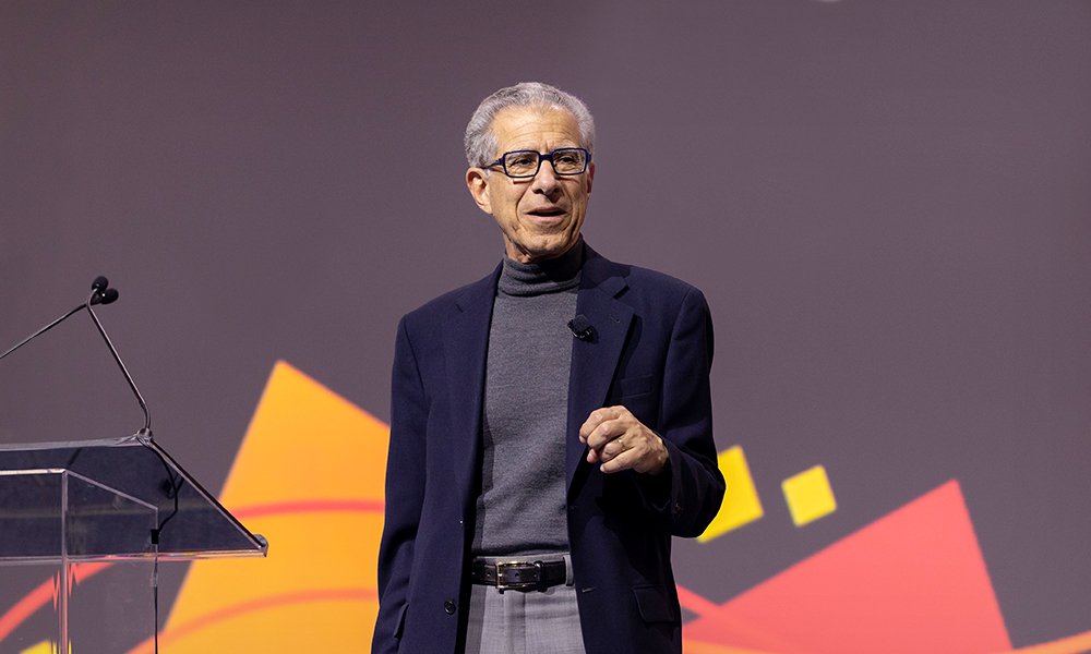 Speaker at a SPIE conference podium 